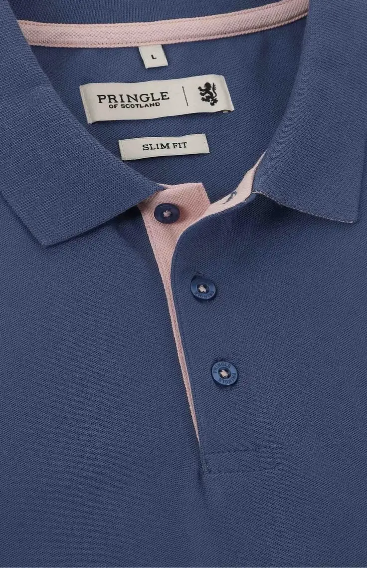 Close view of a custom polo shirt collar placket buttons and pique fabric
