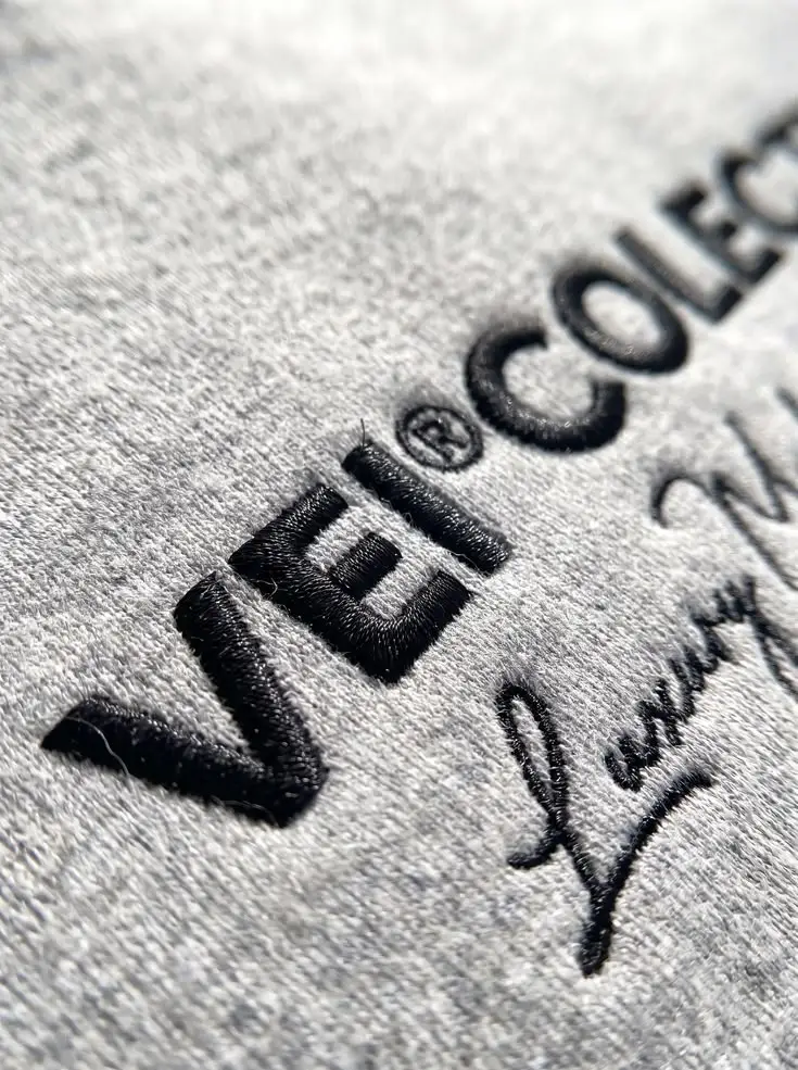 Custom embroidered hoodie logo with controlled stitch density