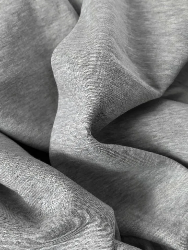 Dense cotton blend knit fabric for a structured heavyweight hoodie
