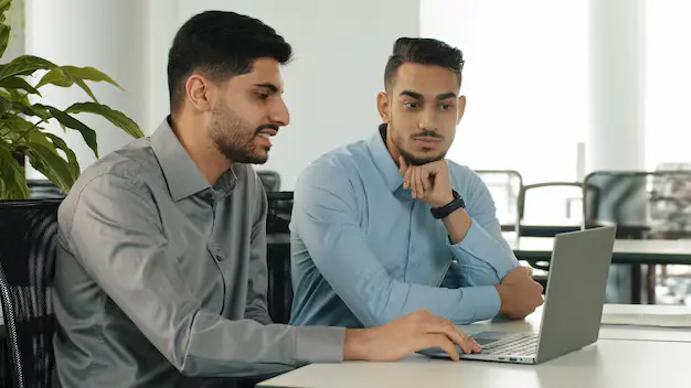 Professional quality control department inspecting custom apparel before export at Velzio Apparel garment manufacturing facility in Sialkot, Pakistan.