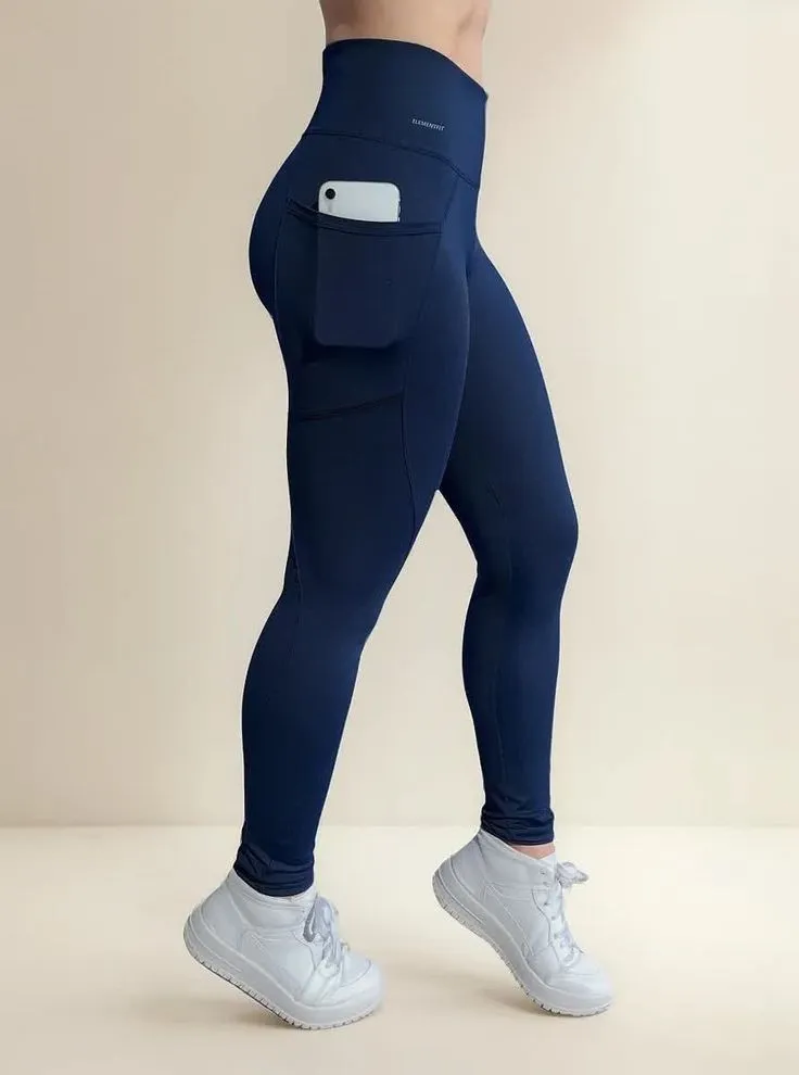 Custom high-rise activewear leggings with clean panel construction and side pocket
