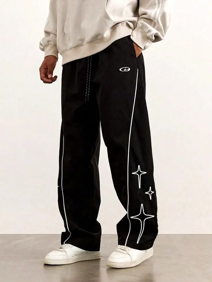 Custom streetwear joggers with relaxed silhouette and branded drawcord details